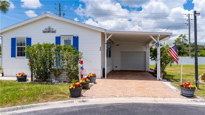 View of front of home with a carport