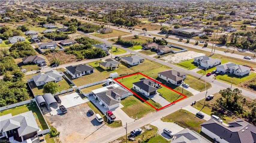 Birds eye view of property with a residential view