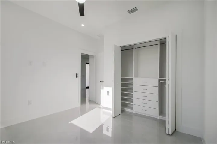 Unfurnished bedroom featuring visible vents, a ceiling fan, recessed lighting, a closet, and baseboards