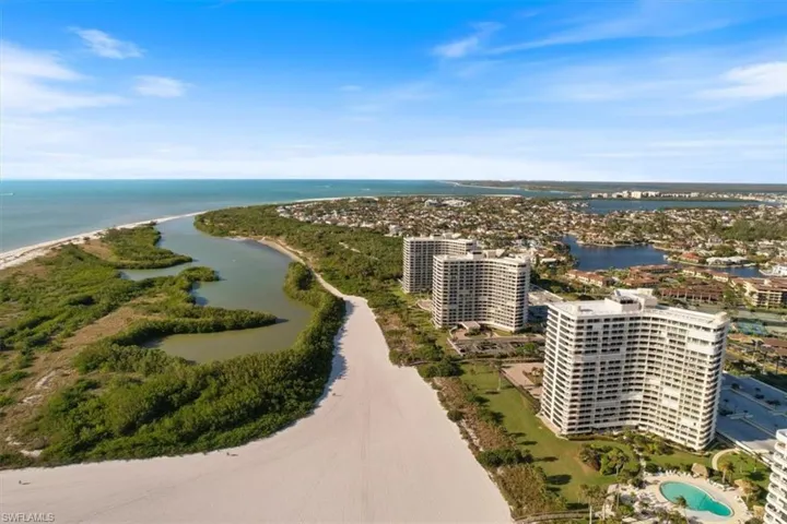 Bird's eye view with a view of the beach and a water view