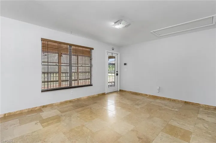 View of tiled empty room
