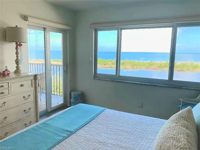 Owner's Bedroom w/Windows & Sliders Overlooking Beach View 2