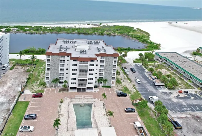 Aerial view of Sand Caper & Pool w/Gulf of Mexico & Beach in the Background