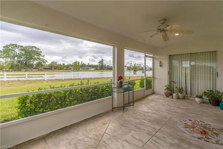 Community pool with a patio