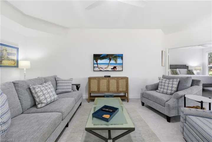 Living room featuring a ceiling fan