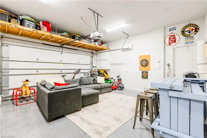 Air-conditioned garage with bar/game room