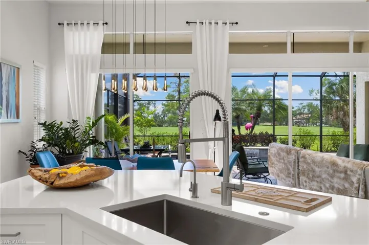 Beautiful quartz island with instant hot water heater.