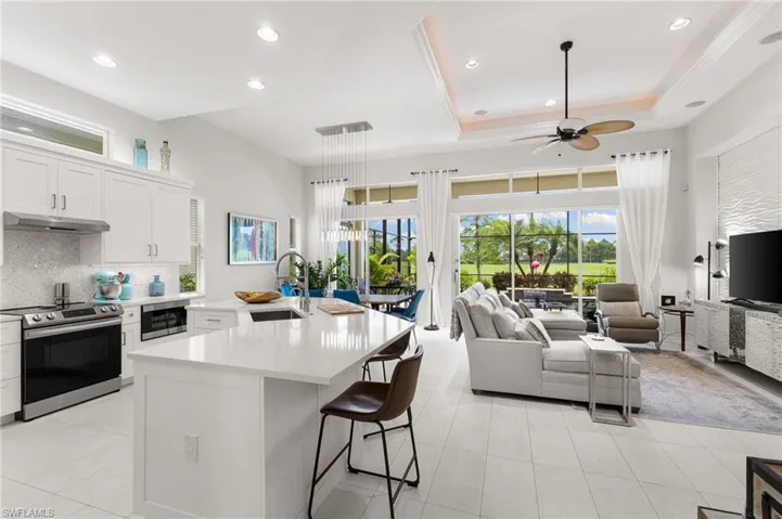 Beautiful wide open floor plan with upgraded travertine tile througout.
