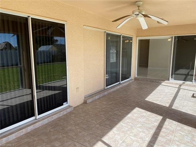 Large, under truss screened lanai (10' x 26"). Tiled floor and Hurricane shutters.