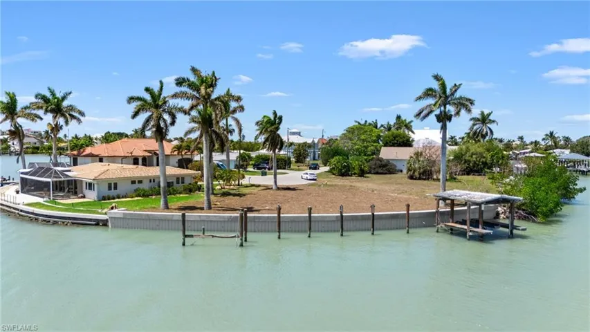 Property view of water featuring a dock