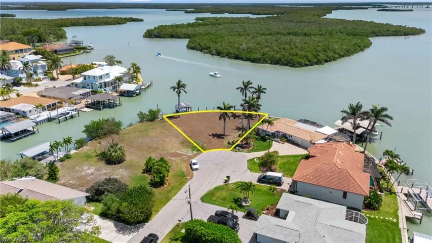 Bird's eye view with a water view and a residential view