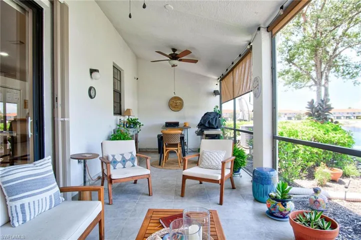 Sunroom / solarium with ceiling fan and a wealth of natural light