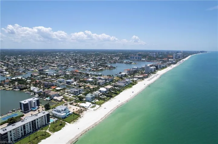 Aerial view with a view of the beach and a water view