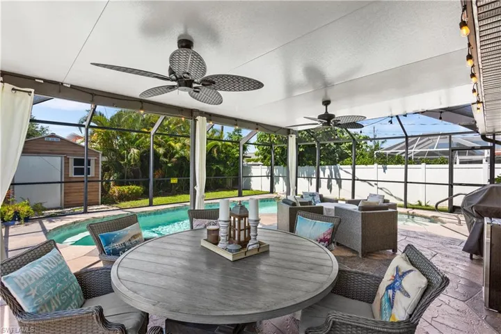 Sunroom / solarium with ceiling fan and a wealth of natural light