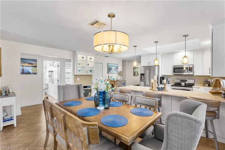 Dining space featuring tile flooring
