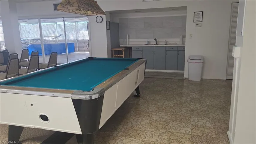 Billiards and kitchenette area in Clubhouse