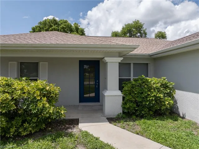 This charming front porch is calling your name