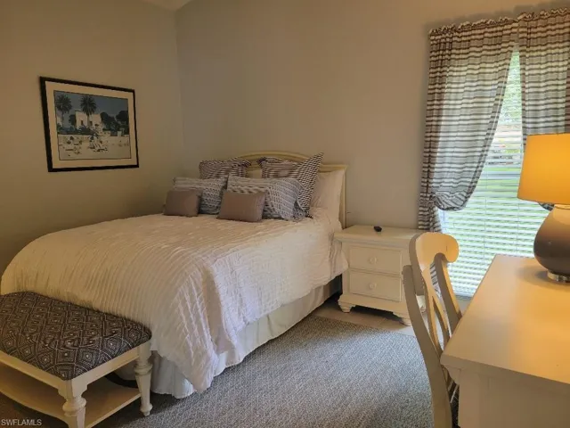 Bedroom with an office area