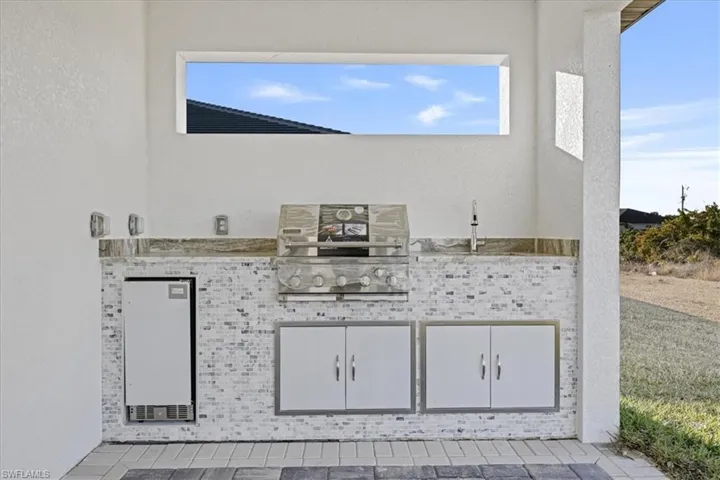 View of patio featuring grilling area