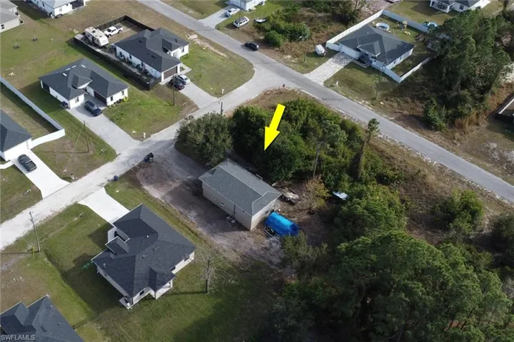 View of property location with nearby suburban area