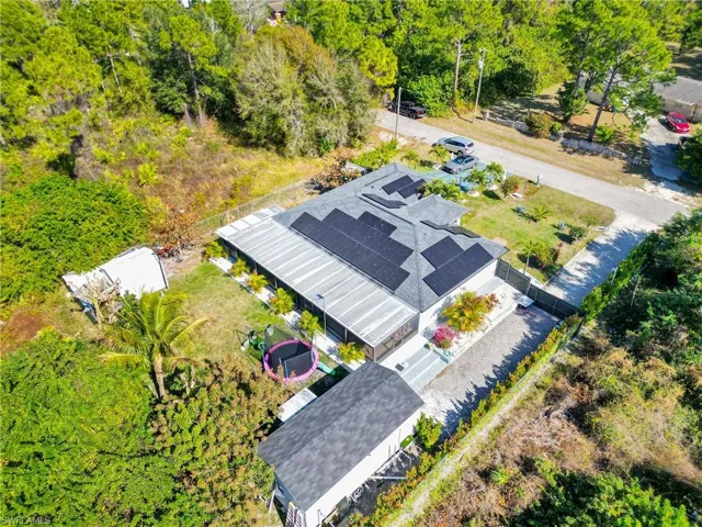 Drone / aerial view of a tree filled landscape