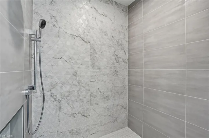 Bathroom with tiled shower