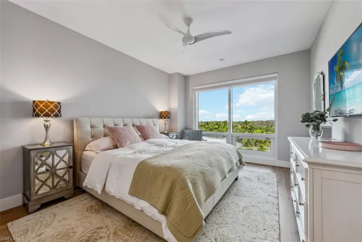 Bedroom featuring light wood-style flooring and ceiling fan