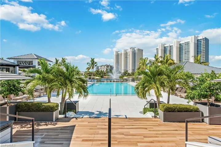 Community pool featuring a patio