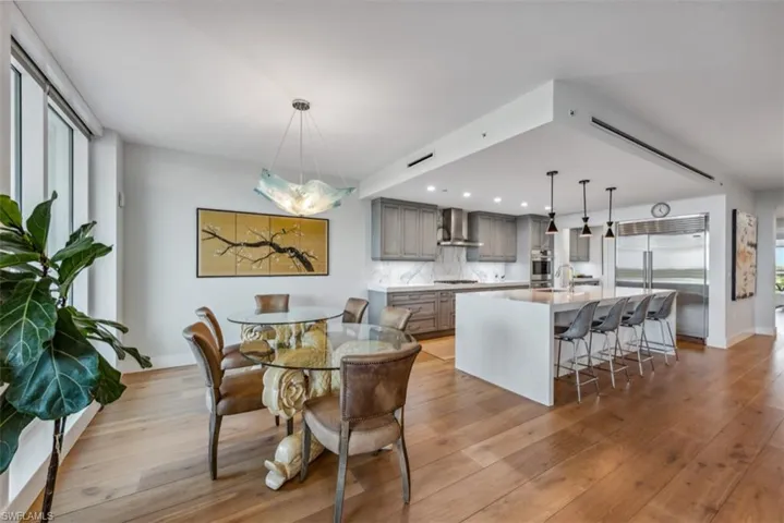 Dining room featuring light wood-style floors and recessed lighting