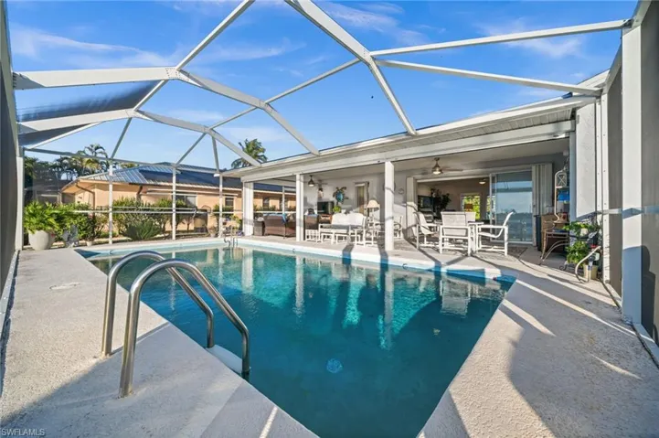 This home is complete with a large under truss lanai and complete electric hurricane protection. No worries here.