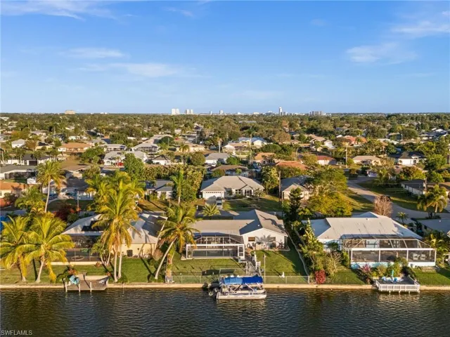 The sun is setting over this one-of-a-kind gem in Cape Coral, Florida.