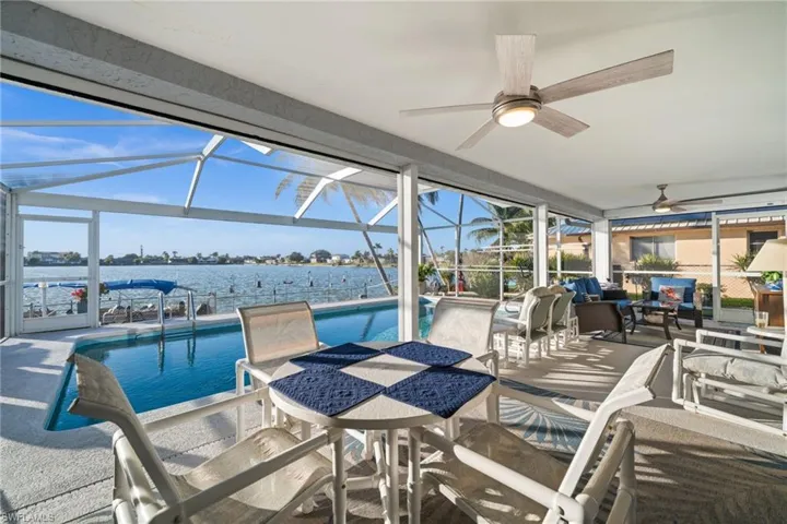 This oversized lanai extends your SW Florida living space. Just look at the "extra rooms" - all with a view!