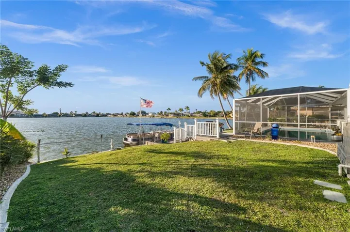 The large side yard, completely fenced, is ready for you and perhaps your four-legged friends.
