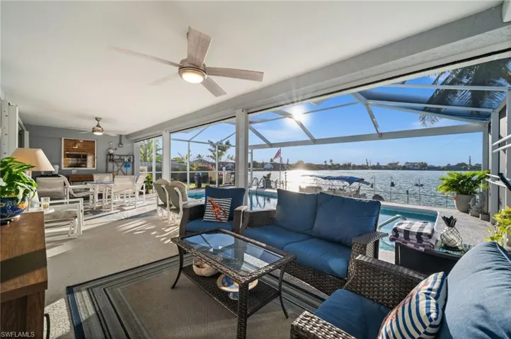 The lanai provides much space for outside dining and relaxation. The oversized pool - steps away. Yours to enjoy!