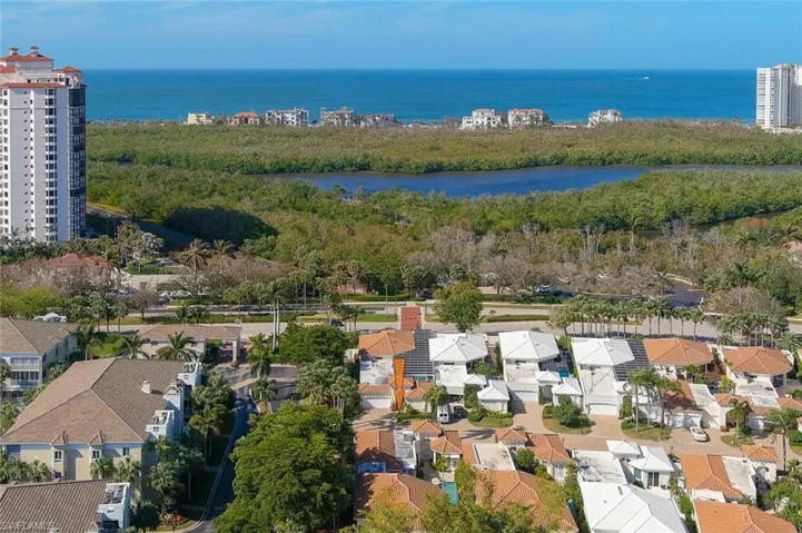 Steps to the Prized Pelican Bay Beach Club