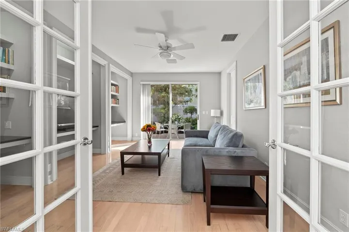 Den/Bedroom 4 with French Doors and Sliders to Private Patio