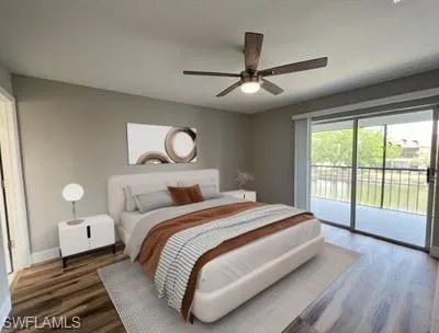 Bedroom featuring access to exterior, dark wood-type flooring, and a ceiling fan