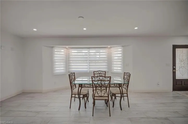 Dining room featuring recessed lighting