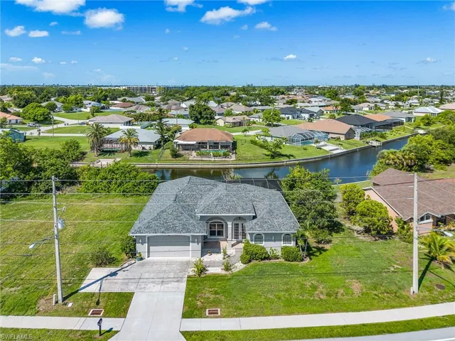 Aerial view of residential area with a large body of water