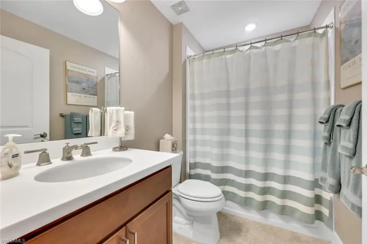 Bathroom upstairs with combination tub/shower