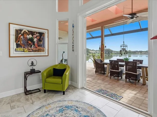Bright breakfast nook overlooking the lanai and lake