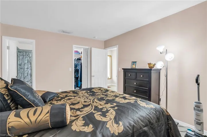 Bedroom featuring a closet and a spacious closet