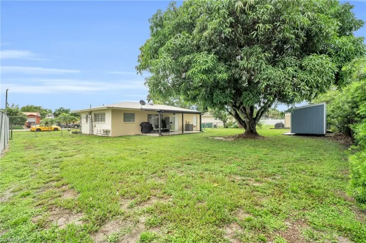 View of yard featuring a storage shed