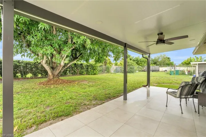 View of patio with ceiling fan
