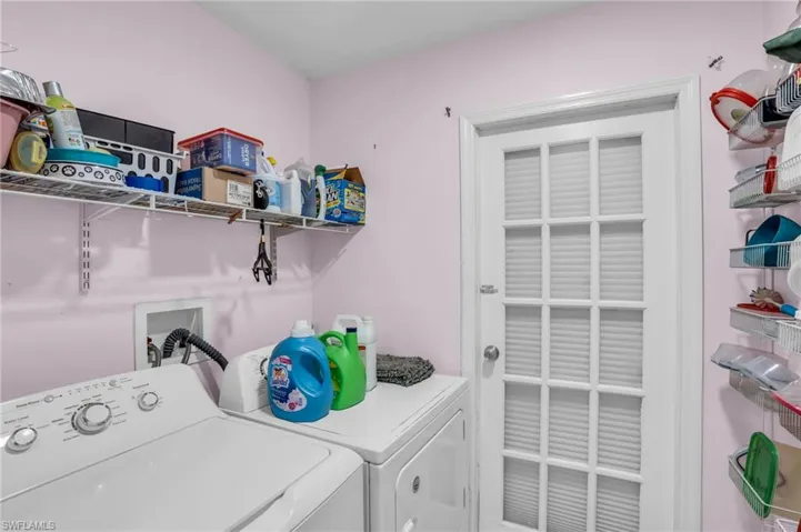 Clothes washing area with washer and dryer