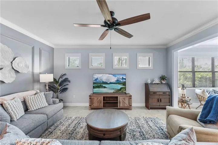 Open concept great room with neutral tones are relaxing and inviting