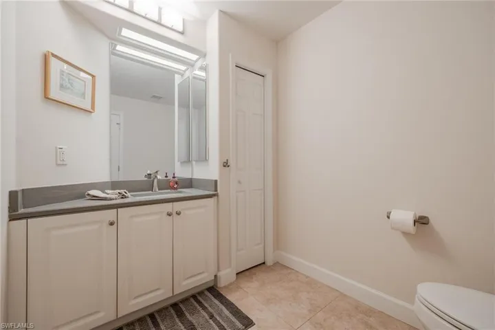 Powder Room with Quartz Countertop.