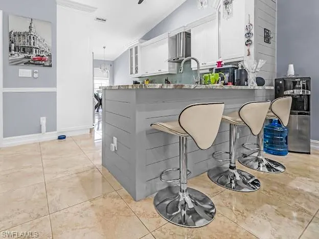 5313  Whitten  DR, Naples, FL 34104