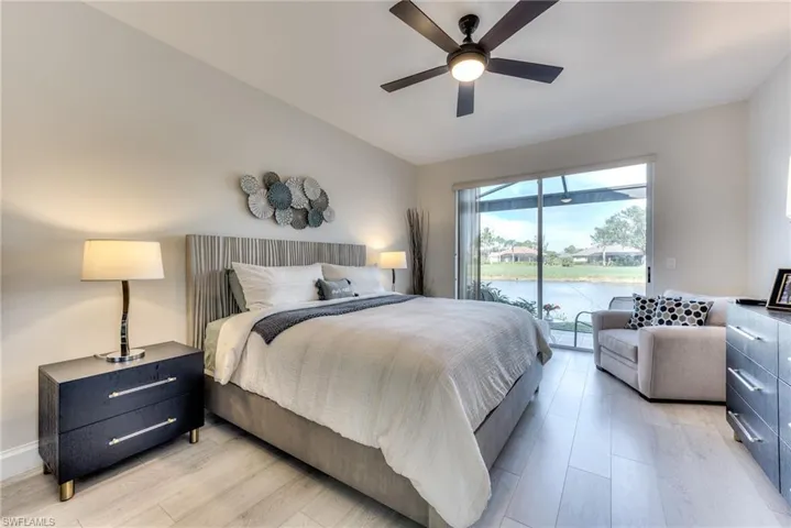 Primary bedroom with slider to the lanai