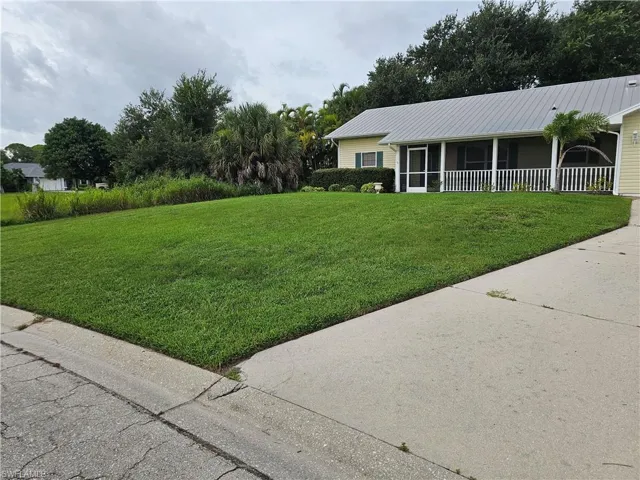 View of front of home featuring a front lawn